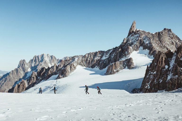 A roped party on the Géant glacier, below the Dent du Géant, above Courmayeur